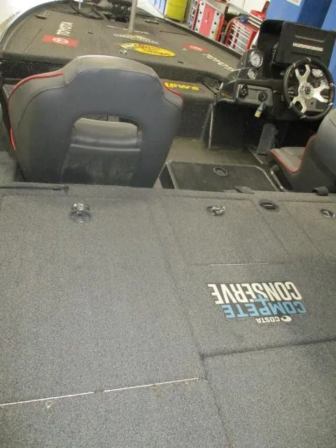 Slide: The Image of 2023 Nitro Z20 boat interior with steering wheel and seating. - 10