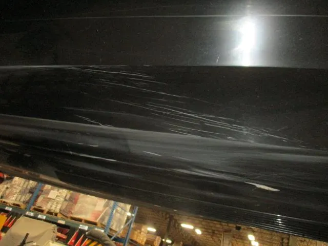 Slide: The Image of Scratched black surface of 2023 Nitro Z20 in a warehouse setting. - 18