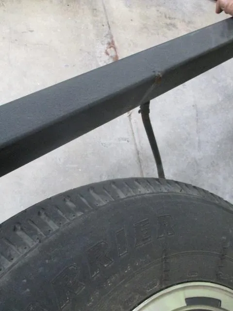 Slide: The Image of Close-up of a Nitro Z20 trailer with a visible tire and metal frame, 2023 model. - 19