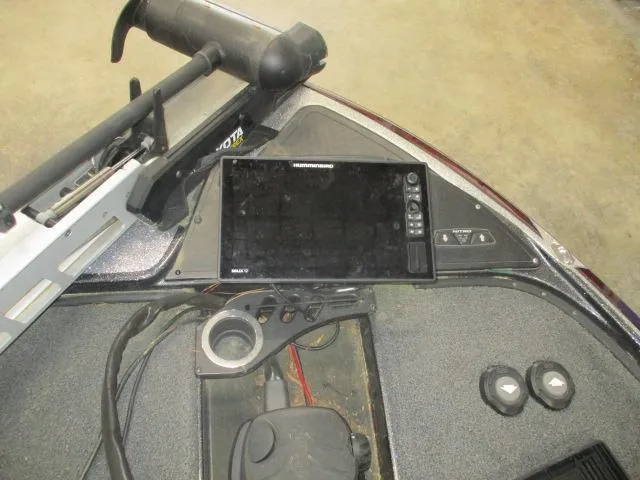 Slide: The Image of 2023 Nitro Z20 boat dashboard with electronic display and controls. - 2
