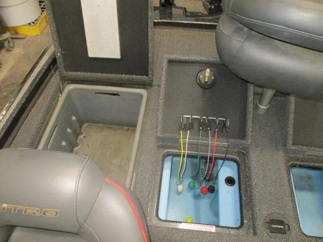 Slide: The Image of Interior of 2023 Nitro Z20 boat showing seating and storage compartments. - 7