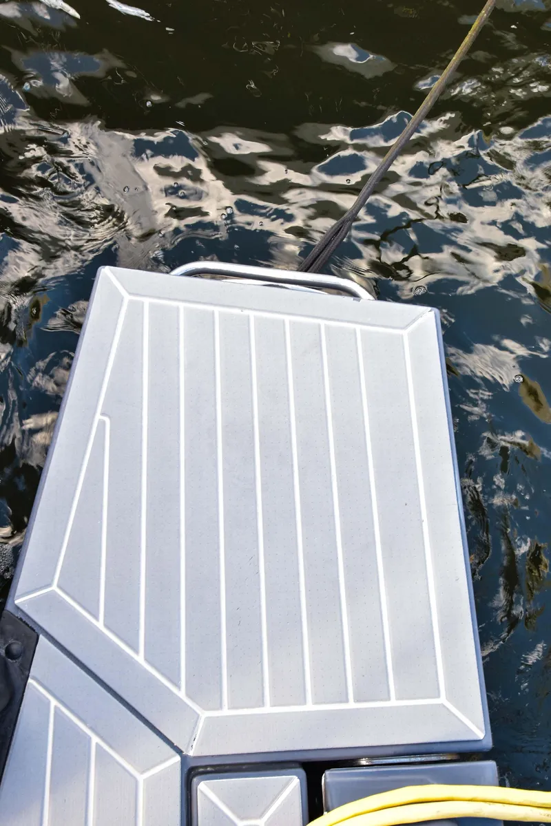 Slide: The Image of 2021 Cruisers Yachts 42 GLS OB swim platform on water. - 19