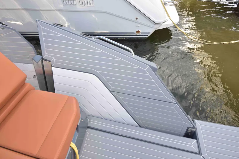 Slide: The Image of 2021 Cruisers Yachts 42 GLS OB swim platform with sleek design and water access. - 20