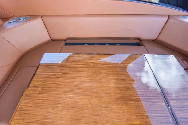 Slide: The Image of Luxurious interior seating and table on 2021 Cruisers Yachts 42 GLS OB. - 29