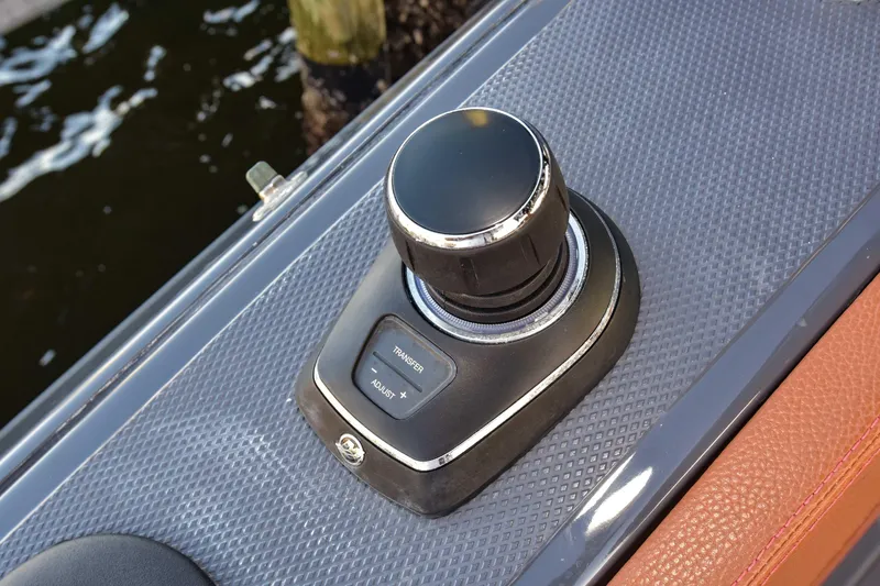Slide: The Image of Joystick control on 2021 Cruisers Yachts 42 GLS OB boat dashboard. - 38