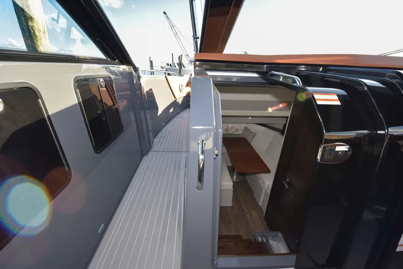 Slide: The Image of 2021 Cruisers Yachts 42 GLS OB cabin entrance with sleek design and modern interior. - 48