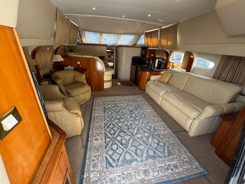 Slide: The Image of Luxurious interior of 2004 Carver 420 Mariner yacht with elegant seating and decor. - 2