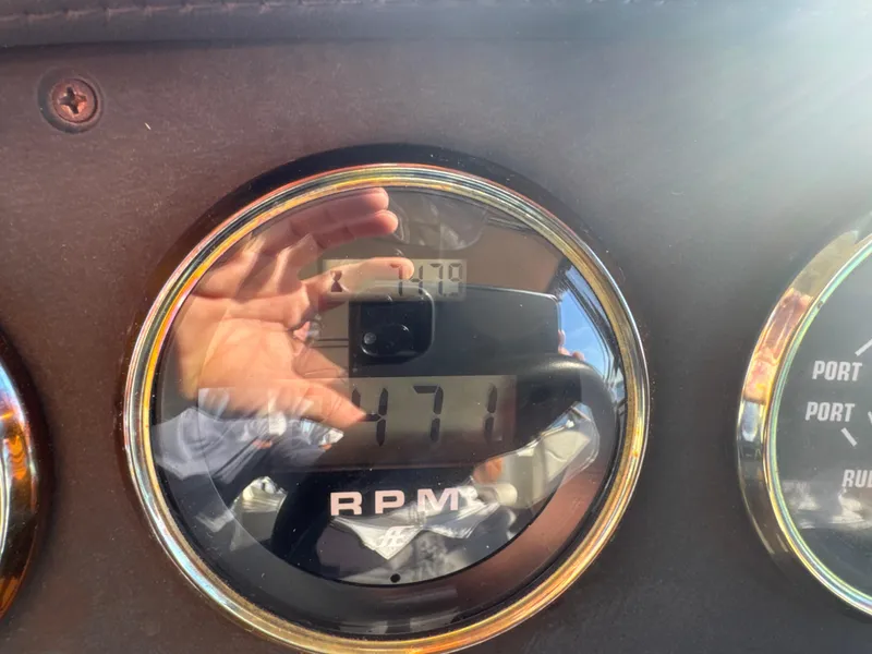 Slide: The Image of Close-up of RPM gauge on 2004 Carver 420 Mariner boat dashboard. - 21