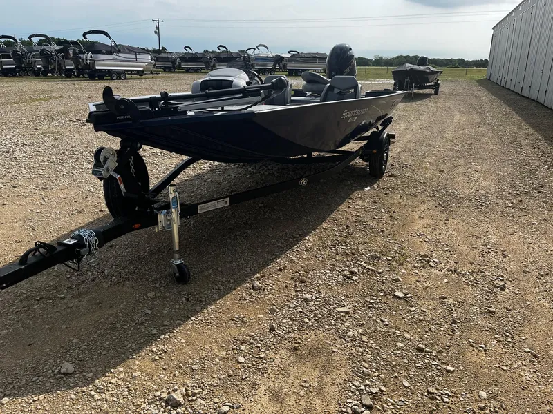 Slide: The Image of 2025 G3 Sportsman 1710 boat on a gravel lot, ready for transport. - 3