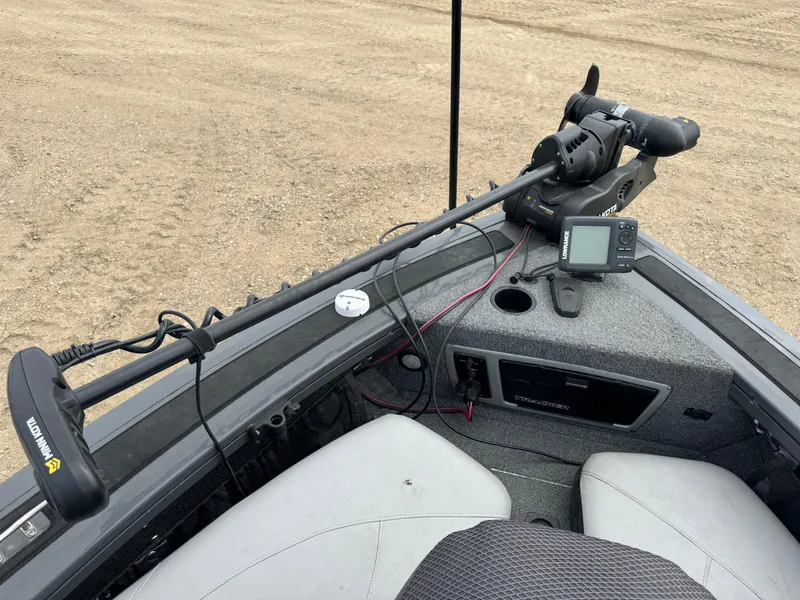 Slide: The Image of 2016 Tracker Targa V-18 Combo boat interior with trolling motor and navigation system. - 16