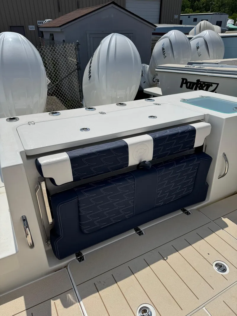 Slide: The Image of 2025 Parker 2600 Center Console boat with foldable seating and modern design. - 5