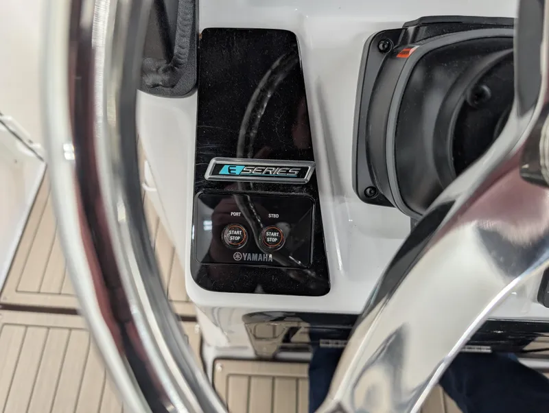 Slide: The Image of 2024 Yamaha Boats 255 FSH Sport H steering console with E-Series controls. - 6