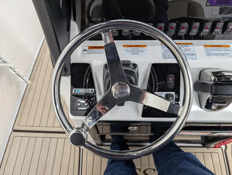 Slide: The Image of Steering wheel and controls of 2024 Yamaha Boats 255 FSH Sport H. - 7