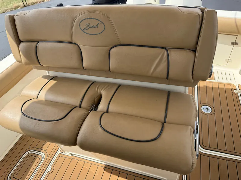 Slide: The Image of Luxurious tan seating on 2016 Scout 300 LXF boat, featuring elegant design and comfort. - 12