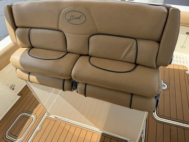 Slide: The Image of Luxurious tan leather seating on 2016 Scout 300 LXF boat, featuring elegant design and comfort. - 15