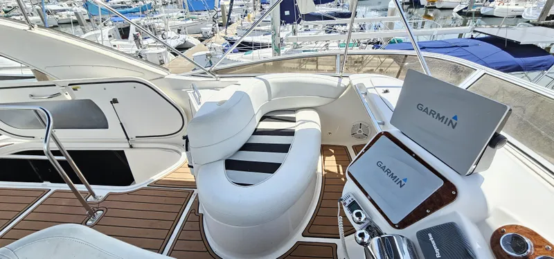 Slide: The Image of Luxurious 2007 Meridian 341 Sedan yacht interior with Garmin navigation system and elegant seating. - 18