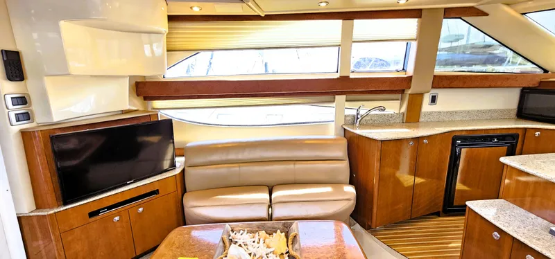Slide: The Image of Luxurious interior of a 2007 Meridian 341 Sedan yacht with leather seating and modern amenities. - 4