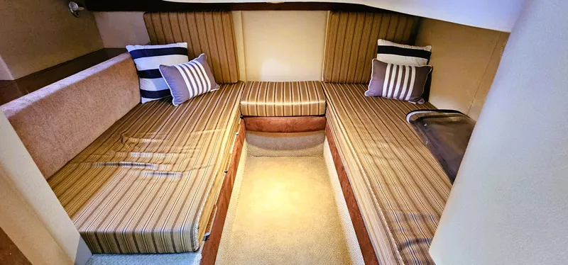 Slide: The Image of 2007 Meridian 341 Sedan cabin interior with striped cushions and pillows. - 9