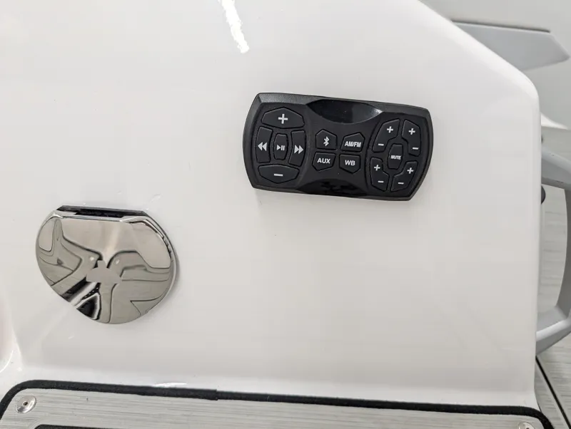 Slide: The Image of Control panel on 2024 Yamaha Boats 275 SE, featuring audio and auxiliary controls. - 3