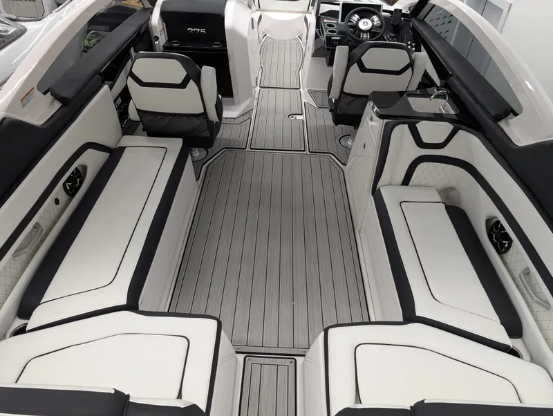Slide: The Image of 2024 Yamaha Boats 275 SE interior with sleek seating and modern design. - 4