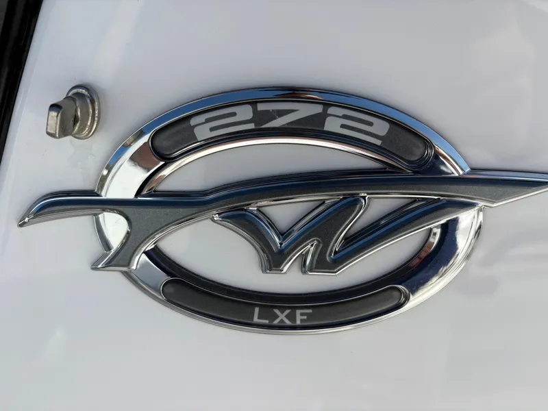 Slide: The Image of 2023 Tidewater 272 LXF emblem on boat exterior. - 14