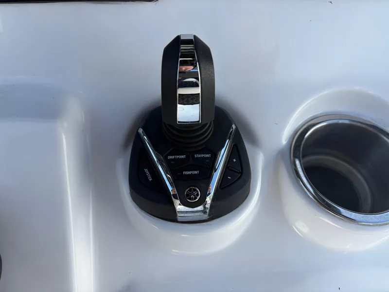 Slide: The Image of Joystick control on 2023 Tidewater 272 LXF boat dashboard, featuring sleek design and functionality. - 4