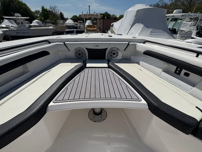 Slide: The Image of 2023 Tidewater 272 LXF boat interior with sleek seating and modern design. - 9