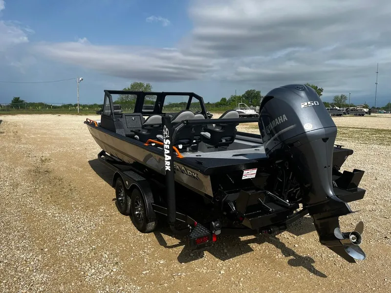 Slide: The Image of 2025 SeaArk ProCat 240 boat with Yamaha 250 engine on a trailer. - 5