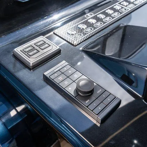 Slide: The Image of Control panel of 2023 Solaris Power 40 Open yacht, featuring modern navigation controls. - 17