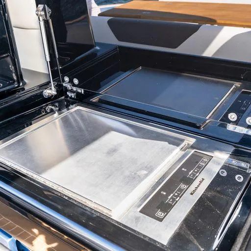 Slide: The Image of Modern kitchen setup on 2023 Solaris Power 40 Open yacht, featuring sleek appliances. - 21