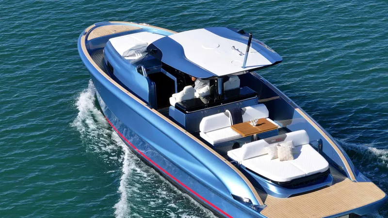 Slide: The Image of 2023 Solaris Power 40 Open yacht cruising on blue water. - 8