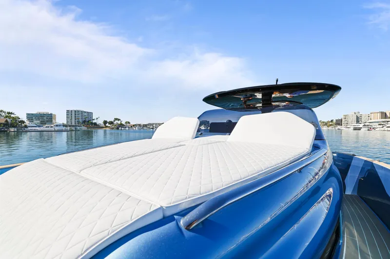 Slide: The Image of 2023 Solaris Power 40 Open yacht with sleek design on calm water. - 9