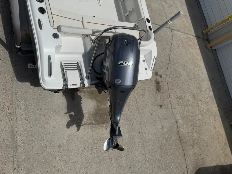 Slide: The Image of 2021 Sea Hunt Ultra 219 boat with Yamaha 200 outboard motor, viewed from above. - 16