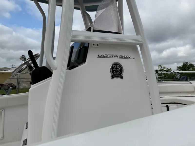 Slide: The Image of 2021 Sea Hunt Ultra 219 boat console with 25th anniversary emblem. - 3