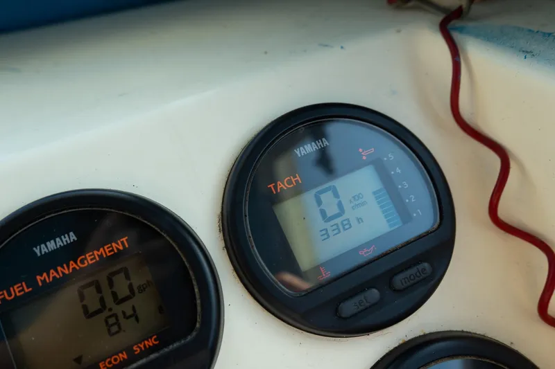 Slide: The Image of Yamaha tachometer and fuel management gauges on 2005 Parker 2520 Deep Vee Sport Cabin boat. - 29