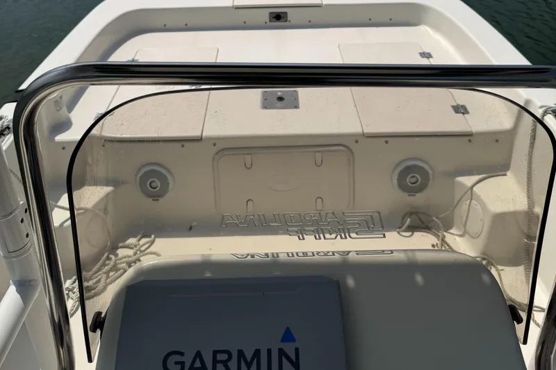 Slide: The Image of 2021 Carolina Skiff 21 LS boat interior with Garmin equipment, viewed from the helm. - 8