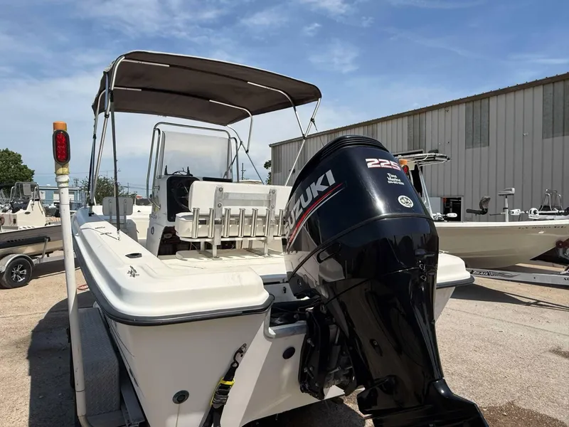 Slide: The Image of 1999 Hydra-Sports 22 Bay Sport boat with Suzuki 225 engine, docked outdoors. - 8