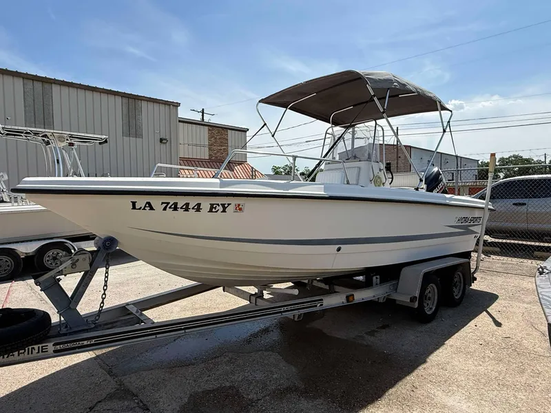 Slide: The Image of 1999 Hydra-Sports 22 Bay Sport boat on trailer, parked outdoors. - 9