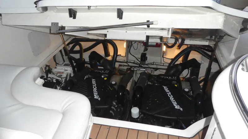 Slide: The Image of Engine compartment of 2007 Sea Ray 340 Sundancer with twin Mercury engines. - 30