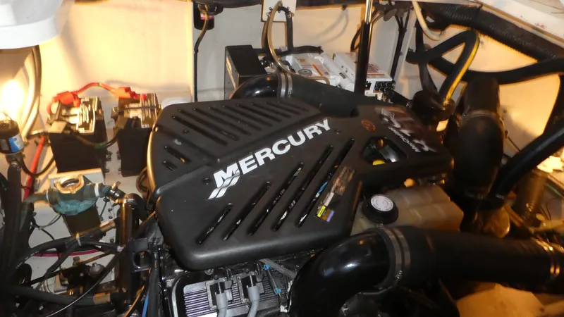 Slide: The Image of Engine compartment of 2007 Sea Ray 340 Sundancer with Mercury engine. - 32