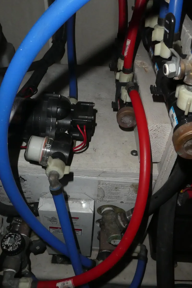 Slide: The Image of Engine compartment of 2007 Sea Ray 340 Sundancer with visible wiring and hoses. - 35