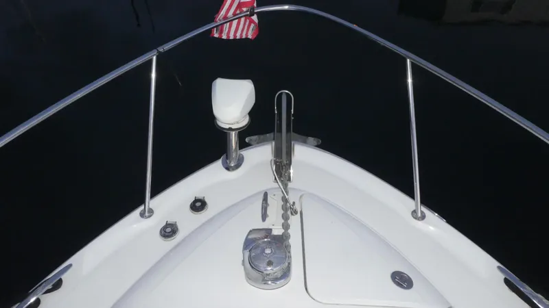 Slide: The Image of Bow of 2007 Sea Ray 340 Sundancer with anchor and American flag. - 40