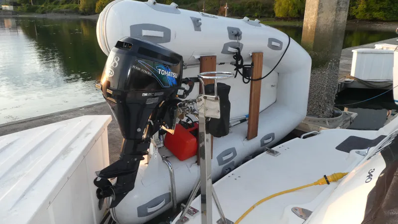 Slide: The Image of Inflatable boat with outboard motor docked beside 2007 Sea Ray 340 Sundancer. - 42