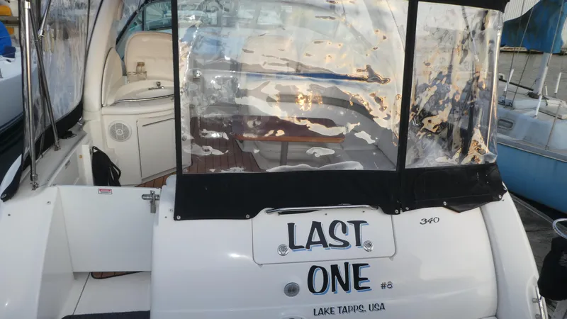 Slide: The Image of 2007 Sea Ray 340 Sundancer boat with "Last One" name, docked at Lake Tahoe, USA. - 6