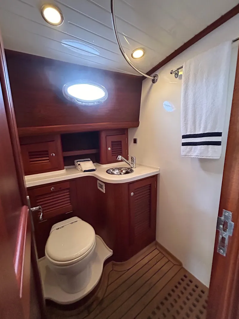 Slide: The Image of Luxurious 2003 Vicem 51 Classic yacht bathroom with wood accents and modern fixtures. - 15