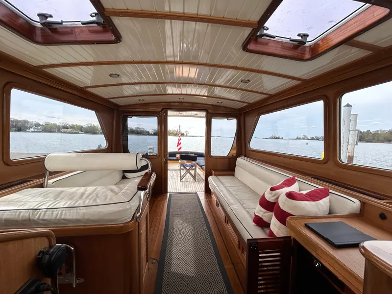 Slide: The Image of Interior of 2003 Vicem 51 Classic yacht with elegant wood finish and waterfront view. - 8