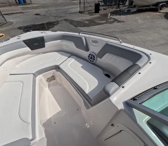 Slide: The Image of 2022 Chaparral 23 SSi OB boat interior with spacious seating in great condition. - 21