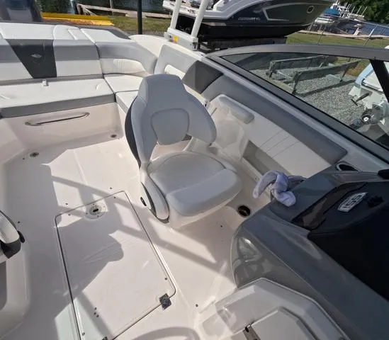 Slide: The Image of 2022 Chaparral 23 SSi OB boat interior, featuring sleek seating and modern design. - 22