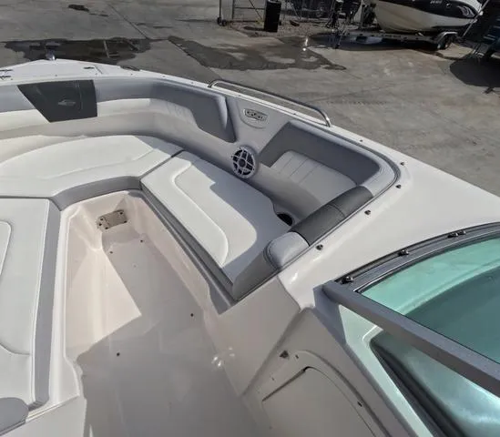 Slide: The Image of 2022 Chaparral 23 SSi OB boat interior, featuring spacious seating in excellent condition. - 24