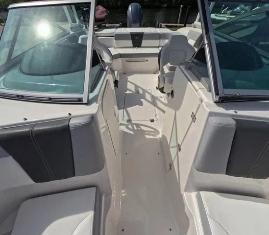 Slide: The Image of 2022 Chaparral 23 SSi OB boat interior, great condition, spacious seating, sleek design. - 32
